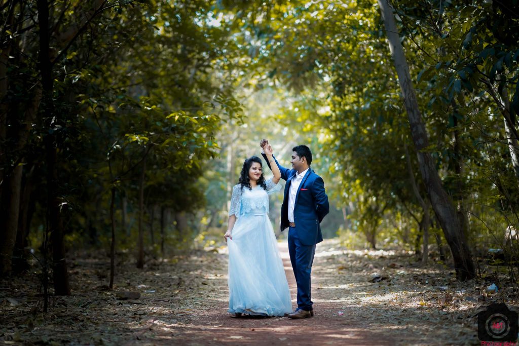 Pre wedding poses in a Park with heavy gown and blazer in Pashan Lake-Pune-India