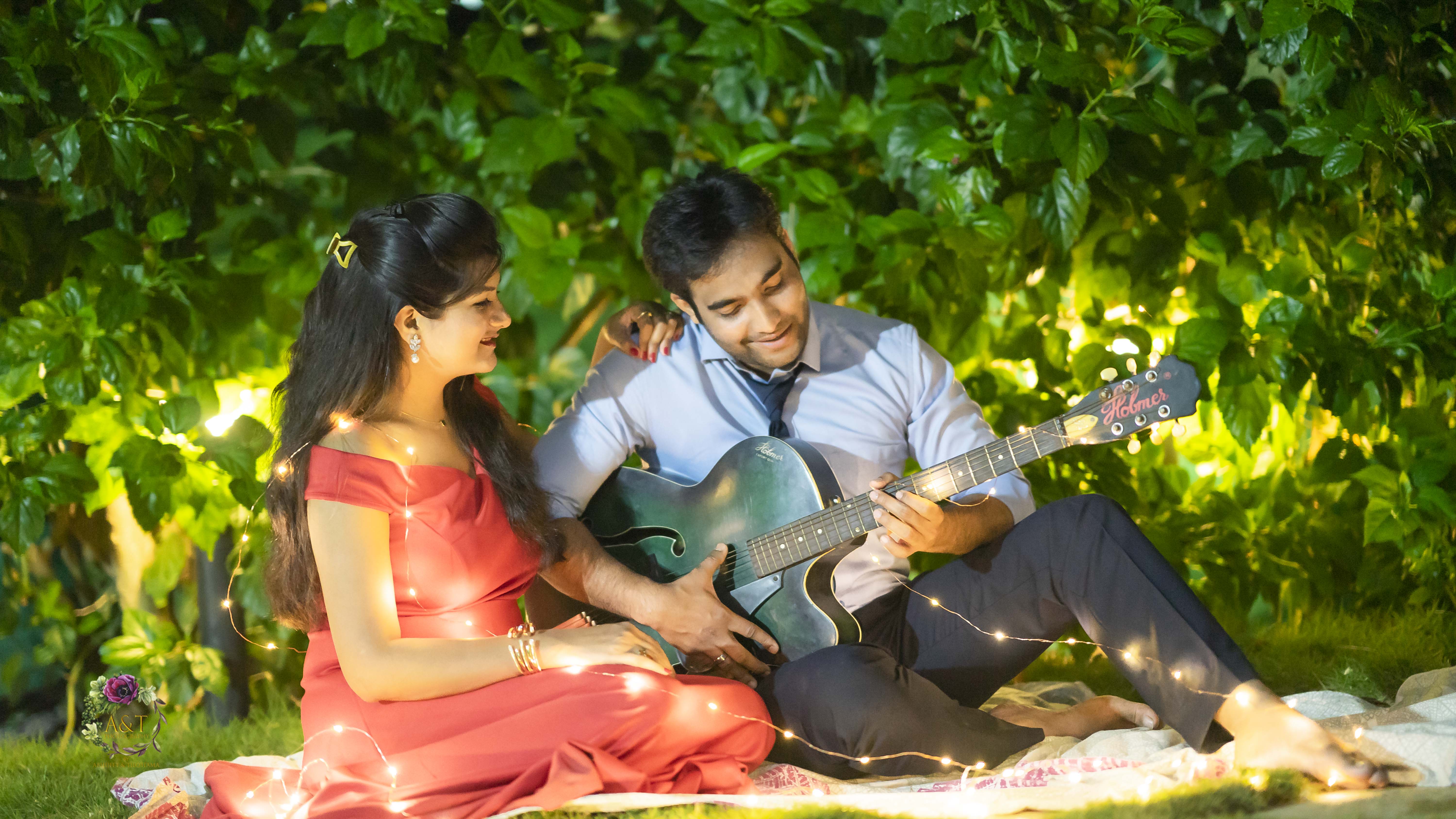 Smiling Couple Playing Guitar Resting Meadow Stock Photo by ©VitalikRadko  215176744