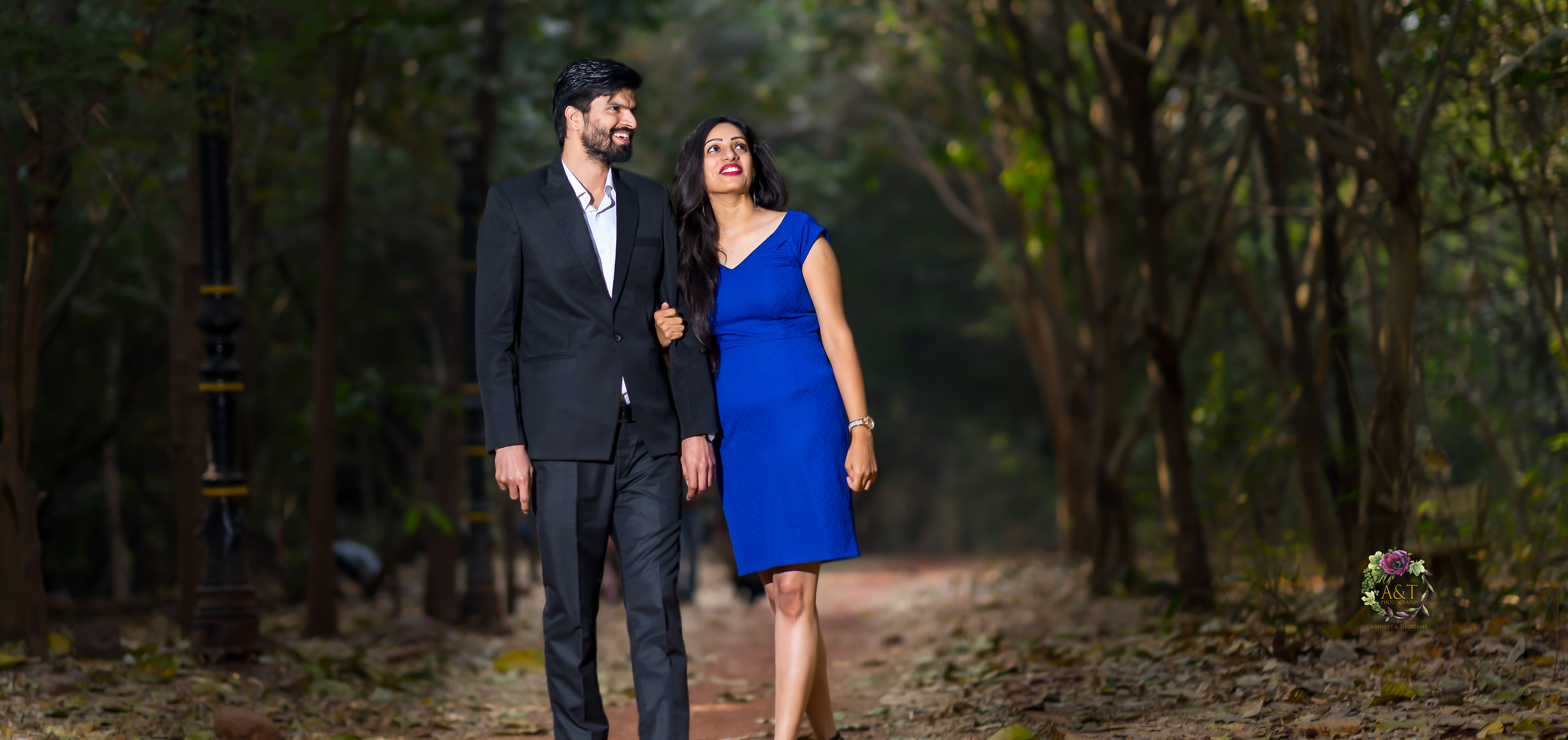 Couple Walking on a beautiful pathway. Picture taken by best pre-wedding photographer in Pune 