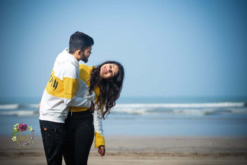Pre-wedding at beach in hoodies by Best Wedding photographer in Pune